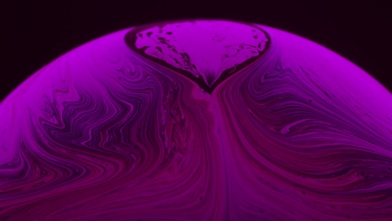 Large Bubble Passing Through Causing Irregular Formation in Liquid Soap
