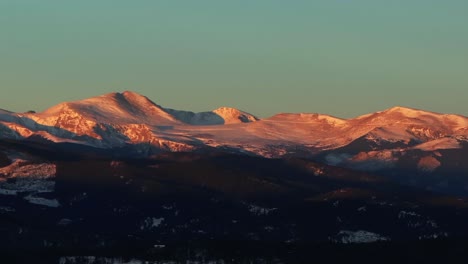 mount blue sky evans 14er evergreen meadows conifer colorado aerial drone golden cold sunrise early morning winter snow valley forest december rocky mountains town circle right parallax motion