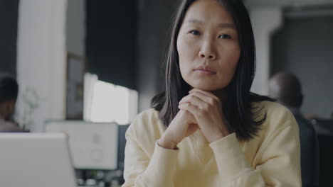 focused woman in office