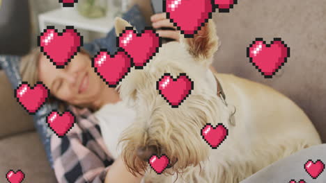 animación de iconos de corazón rojo sobre mujer caucásica con perro mascota