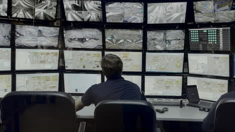 control room with multiple screens for transportation management