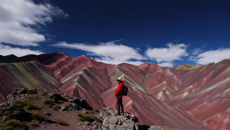 traveler capturing the vibrant colorful mountain landscape