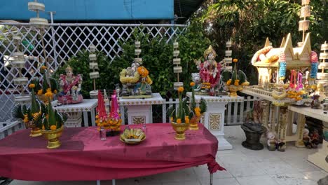 offerings being made at an outdoor shrine