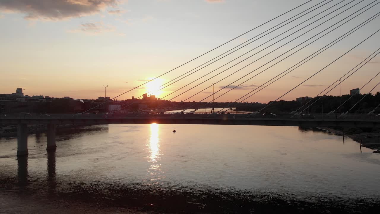 Sunset on the bridge overlooking the city