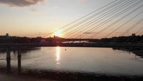 sunset on the bridge overlooking the city