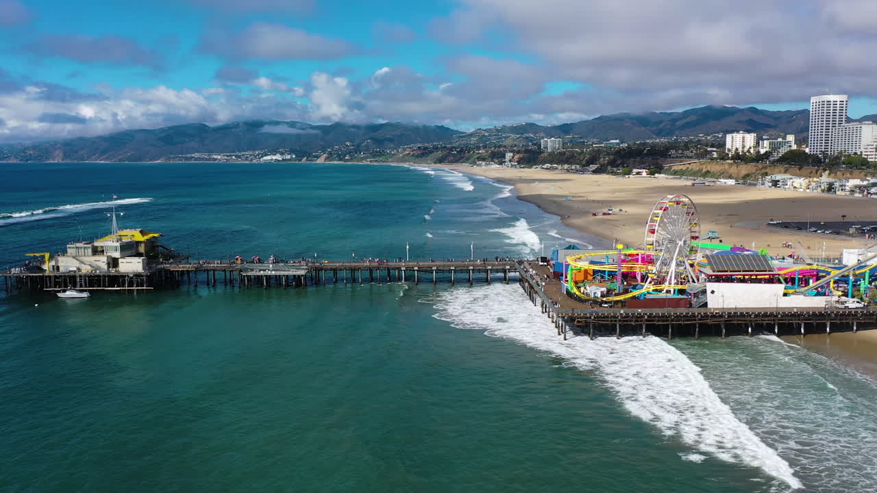 Aerial view around the Santa Monica pier, calm, sunny day in Los Angeles, USA