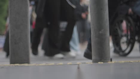 people walking on a busy city street