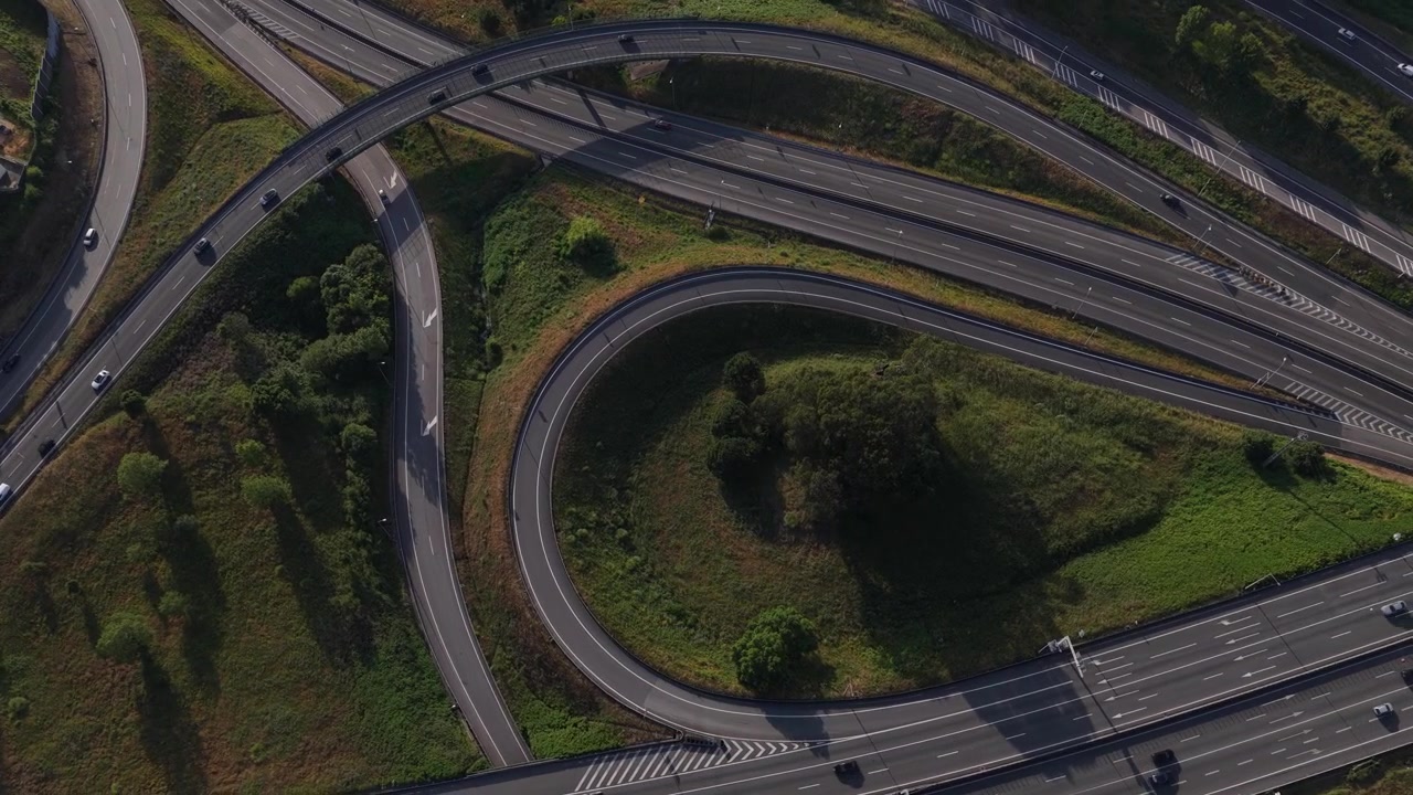 Drone View Complex Highway Interchanges with a lot of cars