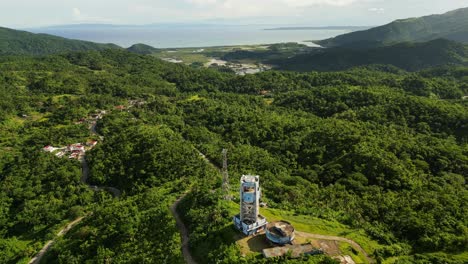 forested mountain at weather radar station in buenavista, bato, catanduanes. aerial drone shot