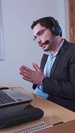 Side Profile of a Man Speaking in a Business Meeting