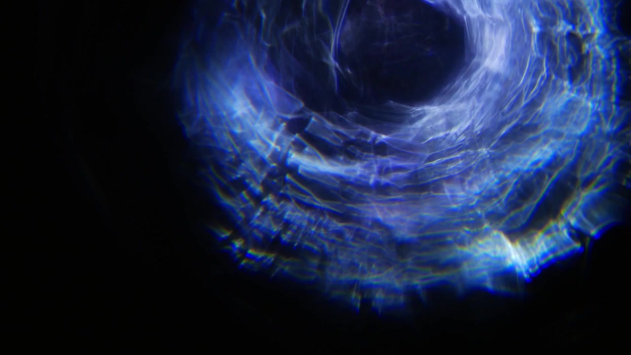 Abstract Blue and Purple Light Leaks on Black Background