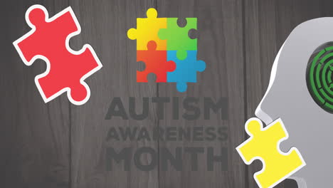 animation of puzzles falling over autism awareness month text and human brain with maze