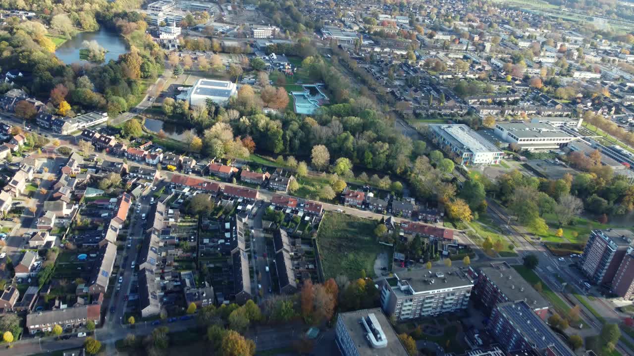 Aerial View of a Residential Area with Buildings and Greenery