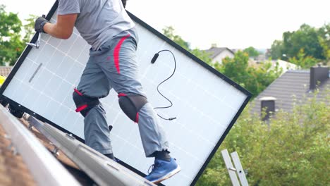 worker solar panel professional carrying photovoltaic cell to install, day