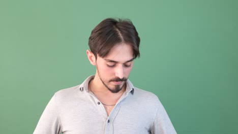 Man-Overwhelmed-in-Green-Background