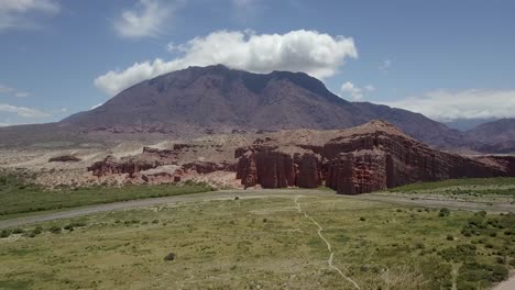 Beautiful-mountainscape-with-a-river-course-in-Cafayate-Valley-on-a-sunny-day