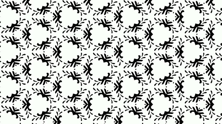 Animation of symmetrical pattern of floral black and white designs popping and fading slowly on white background. Seamless loop. Motion graphics.