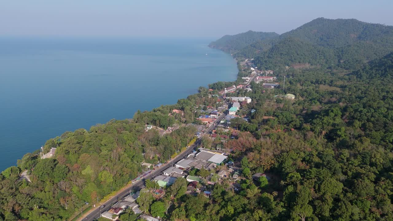 Drone perspective of White Sand Beach village, Koh Chang. Sunny morning aerials of Thailand's coastal beauty on the island of Koh Chang