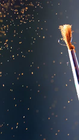 golden glitter paintbrush