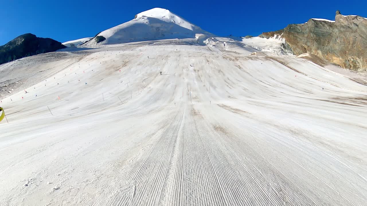 Skiing down a glacier in the mountains