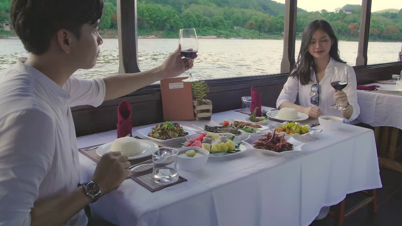 Happy Couple Toasting With Wine Glasses On Boat,Slow Motion
