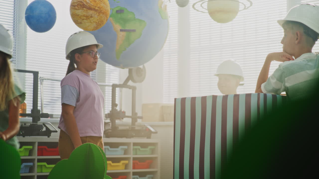 Team of Primary School Students in Hardhats Creating City Planning