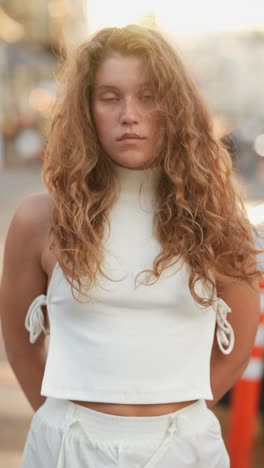 young woman in white outfit