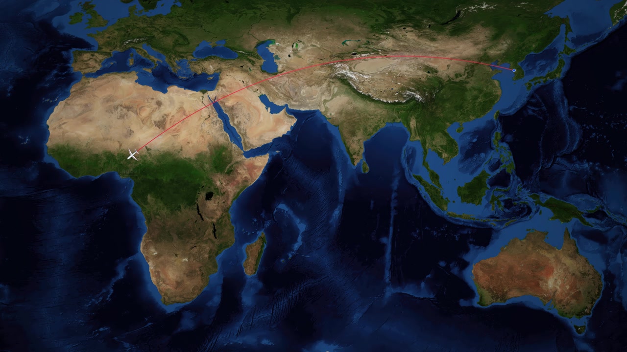 Una linea rossa traccia un aereo che vola su una mappa del mondo da Seul a Lagos.