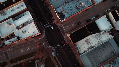 cinematic top down aerial rising and circling top down intersection of e cook ave with n milwaukee ave