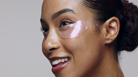 woman with eye patches