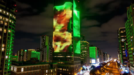 vibrant night cityscape with illuminated skyscrapers