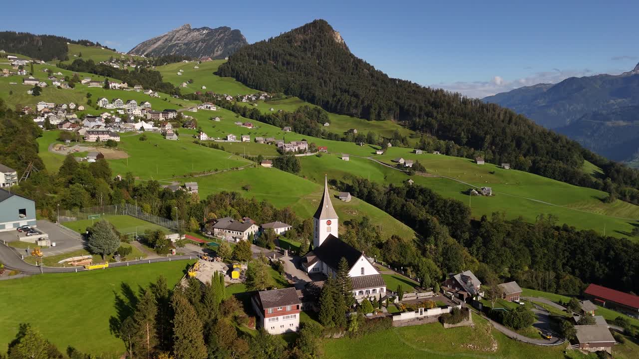 Aerial View of a Charming Village in the Swiss Alps