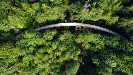 Aerial-flyover-of-trestle-bridge-on-the-Snoqualmie-Valley-Trail,-Washington-State