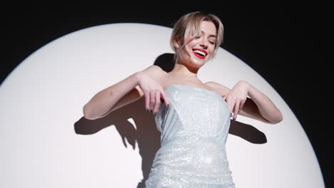 glamorous woman in silver dress