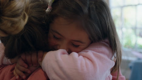 happy-little-girl-hugging-mother-enjoying-loving-mom-embracing-daughter-at-home-4k-footage