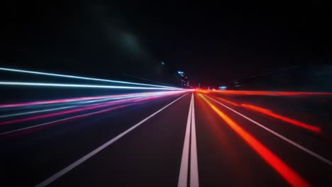 an exhilarating display of motion captured in two frames, showcasing vibrant light trails and the dynamic speed of movement on a night road, highlighting urban energy
