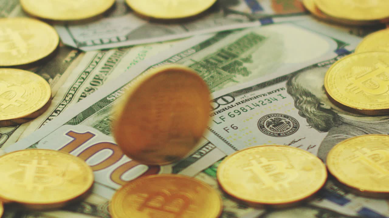 Golden coins and dollar bills