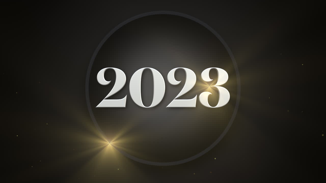 2023 su cerchio nero e luccichii dorati su sfumatura nera
