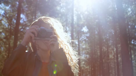 woman clicking photo with camera 4k