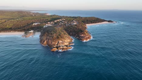 Orbiting-Drone-shot-of-Stradbroke-Islands-Point-Lookout-North-Gorge