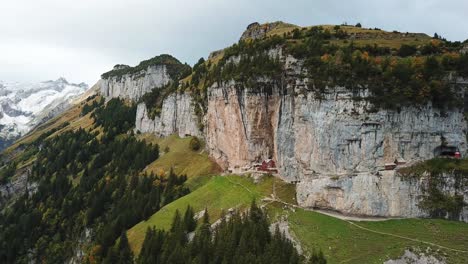 ebenalp, wildkirchli caves carved into a dramatic cliff face in the swiss alps, offering a unique blend of natural beauty packing a lot of interesting activities, äscher, alpstein, switzerland