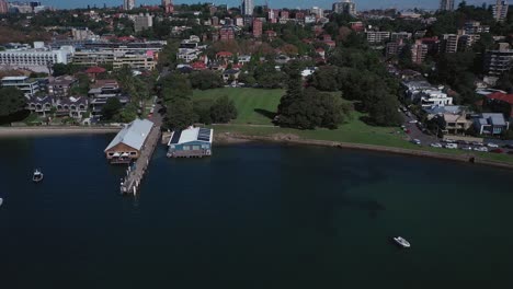 Sydney-Harbor-on-a-beautiful-sunny-day-from-Double-Bay-featuring-boats,-blue-sky-and-water