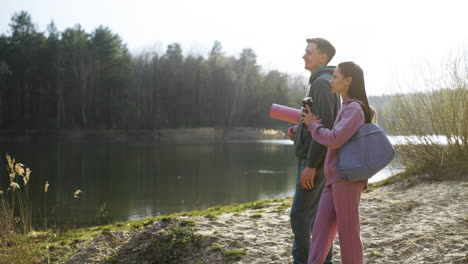 couple talking in the forest