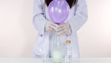 demonstrating chemical reaction with balloon inflation