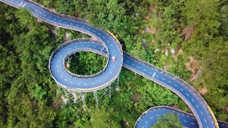 aerial drone shot of curved kart race track in theme park, tonglu, china