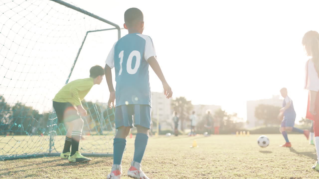 Youth soccer game on a sunny day