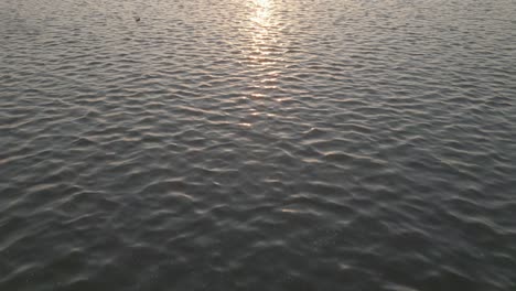 golden hour at clontarf beach in dublin - ireland - 4k drone shot