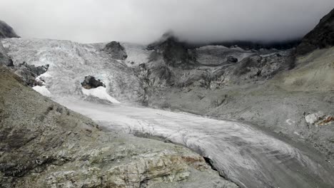 aerial flyover towards the moiry glacier near grimentz in valais, switzerland