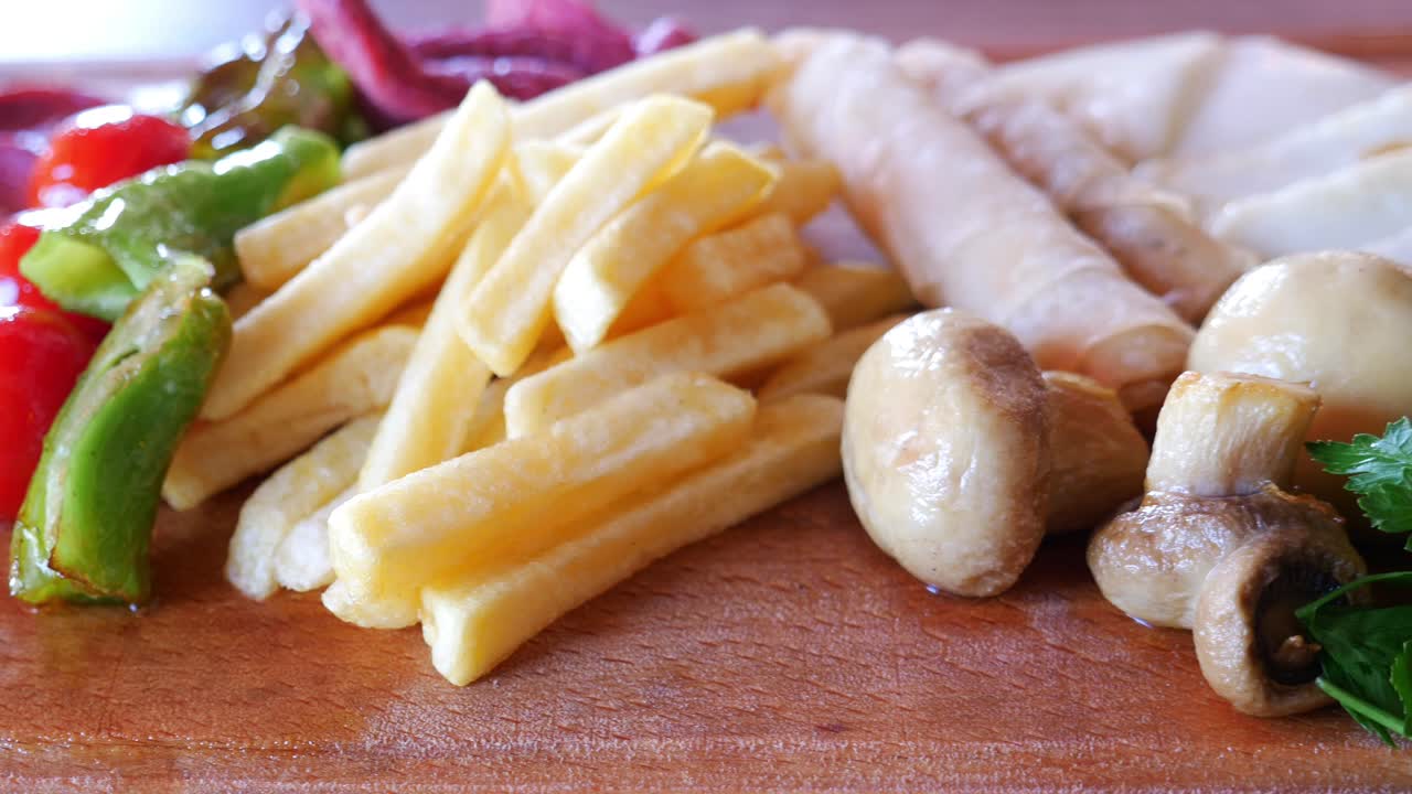 Delicious Mixed Platter with Fries, Vegetables, and Mushrooms
