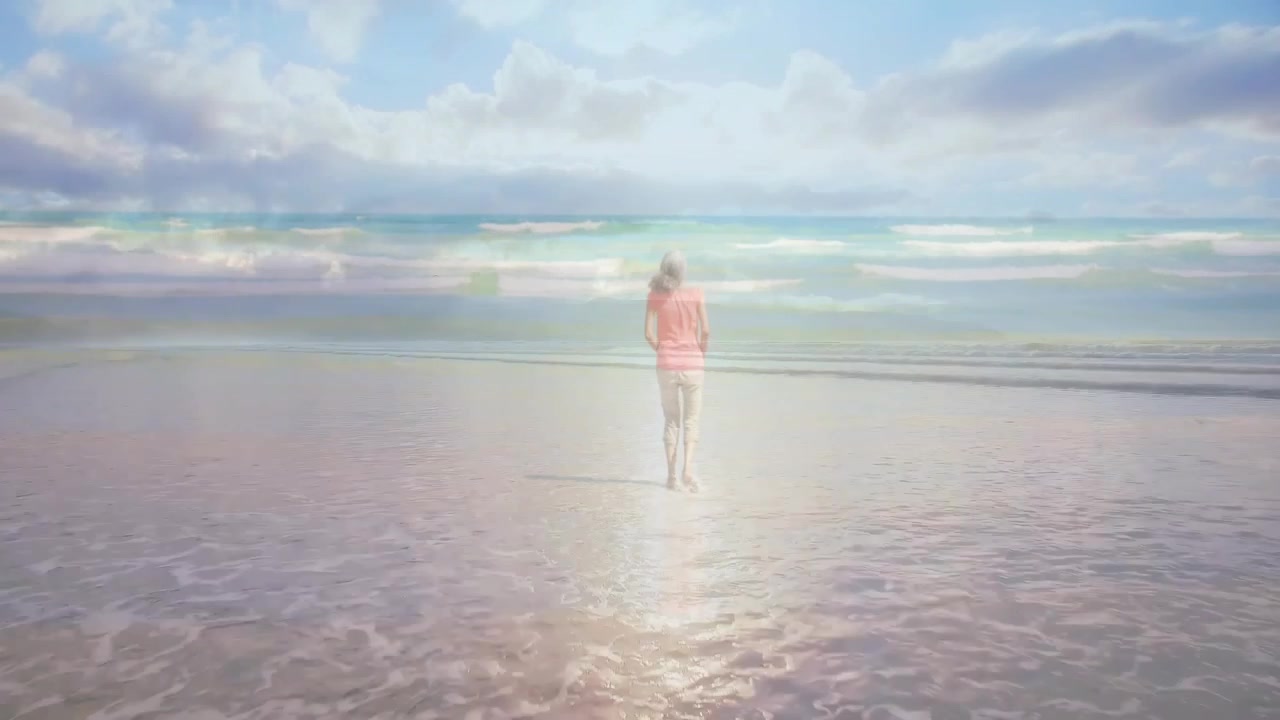 Donna che si ferma e poi cammina verso l'oceano, con una sovrapposizione che segue il bagliore del sole sulla sabbia, alla ricerca del benessere